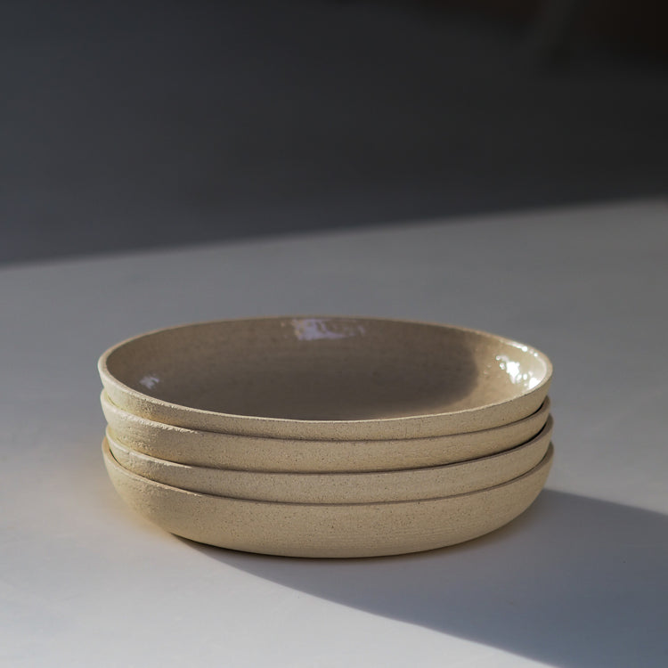 ASSIETTE EVASÉE SABLE TRANSPARENT Ø23CM