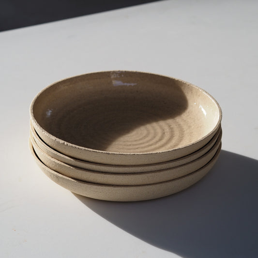 ASSIETTE EVASÉE SABLE TRANSPARENT Ø23CM