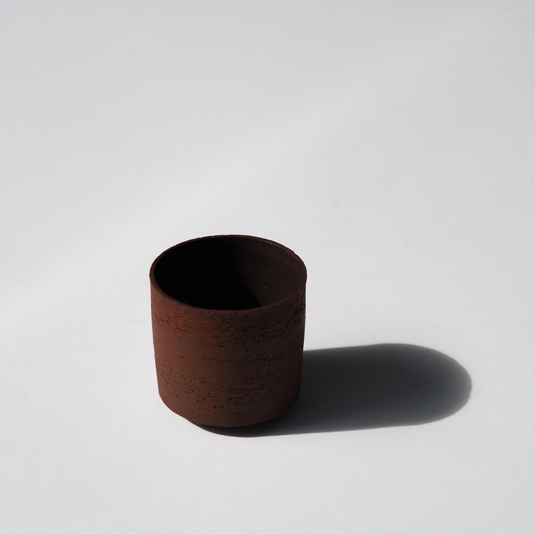GOBELET MOYEN ROUGE TRANSPARENT Ø7CM
